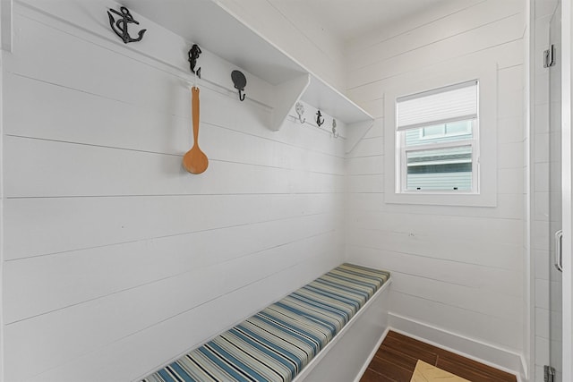 23006 Martes St, Galveston, TX 77554 - mudroom featuring dark wood finished floors and baseboards
