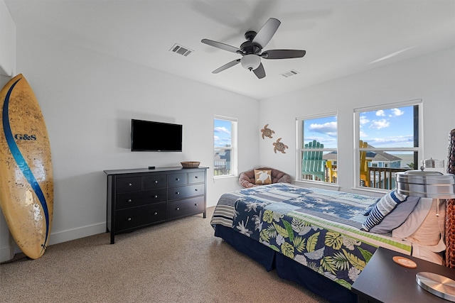 23006 Martes St, Galveston, TX 77554 - carpeted bedroom featuring a ceiling fan and baseboards