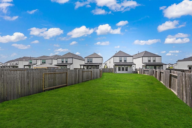 12305 Brandenburg Gate Dr, Houston, TX 77047 - view of yard featuring a residential view and a fenced backyard