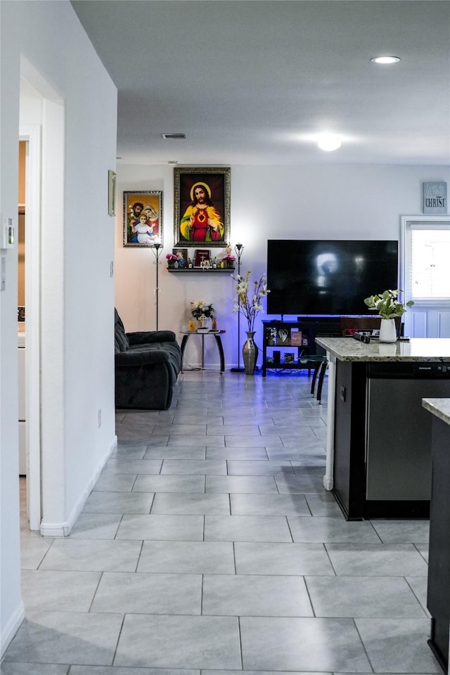 living room featuring visible vents