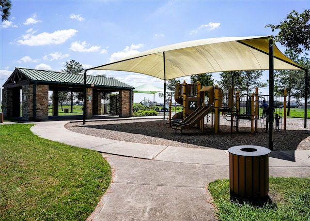 community jungle gym featuring a gazebo and a lawn