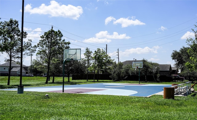 view of sport court with community basketball court and a yard
