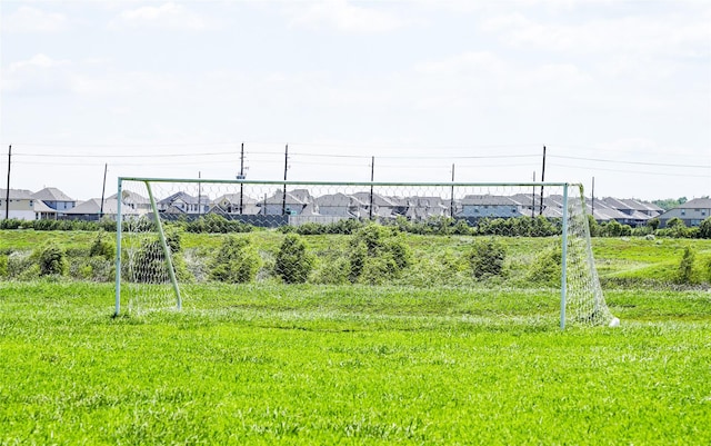 view of yard featuring a residential view