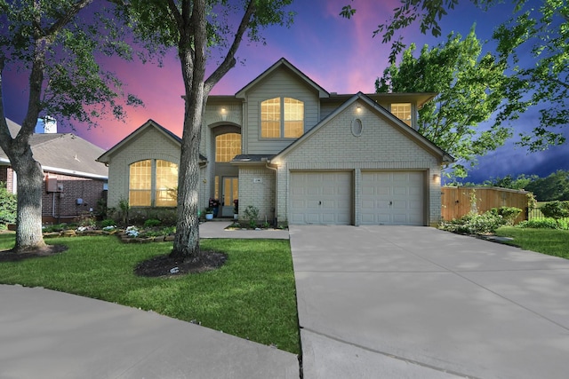 4902 Bellmead Dr, Missouri City, TX 77459 - view of front facade with driveway and an attached garage