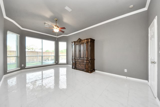 4902 Bellmead Dr, Missouri City, TX 77459 - spare room featuring baseboards, ornamental molding, a ceiling fan, and light marble finish floors