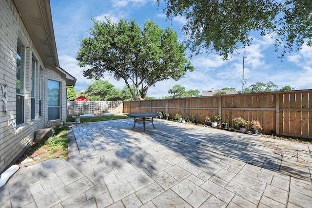 4902 Bellmead Dr, Missouri City, TX 77459 - fenced backyard featuring a patio area and outdoor dining space