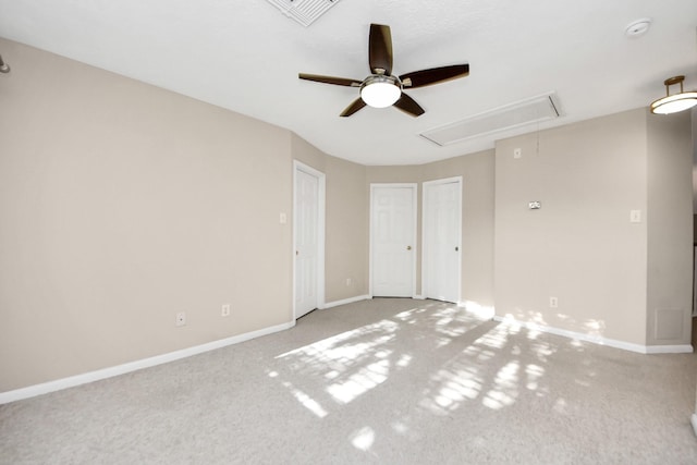 4902 Bellmead Dr, Missouri City, TX 77459 - unfurnished bedroom featuring attic access, multiple closets, baseboards, carpet flooring, and a ceiling fan