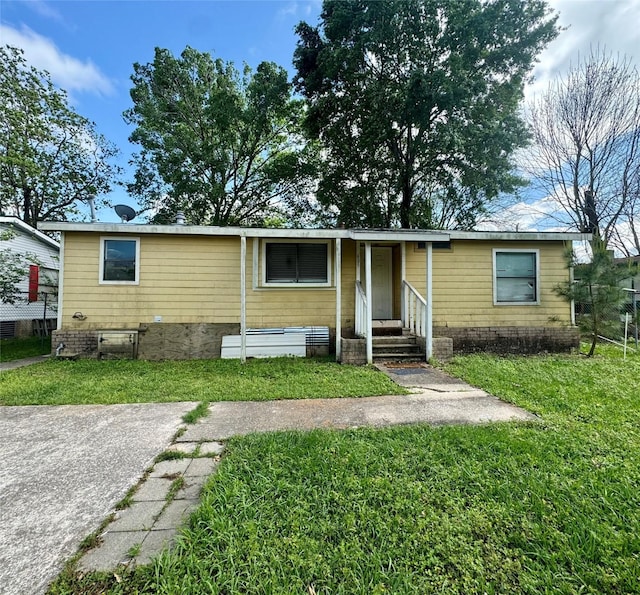 view of front of home with a front yard