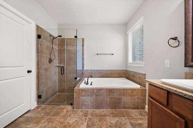 full bath featuring a shower stall, a bath, and vanity
