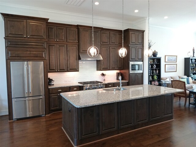 kitchen featuring dark brown cabinetry, stainless steel appliances, and a sink