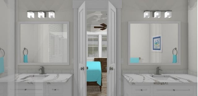bathroom with a sink and two vanities