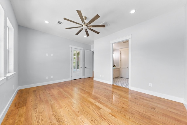 13 Caravelle Ct, Galveston, TX 77554 - spare room with a ceiling fan, light wood-type flooring, and recessed lighting