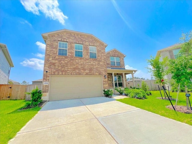 17014 Wild Stream Ct, Conroe, TX 77302 - traditional-style home with driveway, an attached garage, fence, a front lawn, and brick siding