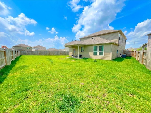 17014 Wild Stream Ct, Conroe, TX 77302 - rear view of property featuring a fenced backyard and a yard