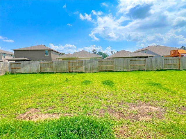 17014 Wild Stream Ct, Conroe, TX 77302 - view of yard featuring a fenced backyard