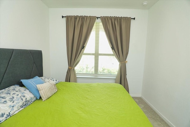 17014 Wild Stream Ct, Conroe, TX 77302 - carpeted bedroom with baseboards