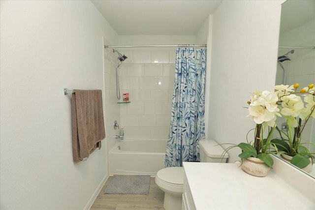 17014 Wild Stream Ct, Conroe, TX 77302 - bathroom with baseboards, shower / tub combo with curtain, toilet, wood finished floors, and vanity