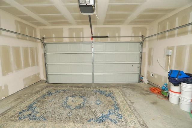 17014 Wild Stream Ct, Conroe, TX 77302 - garage featuring a garage door opener