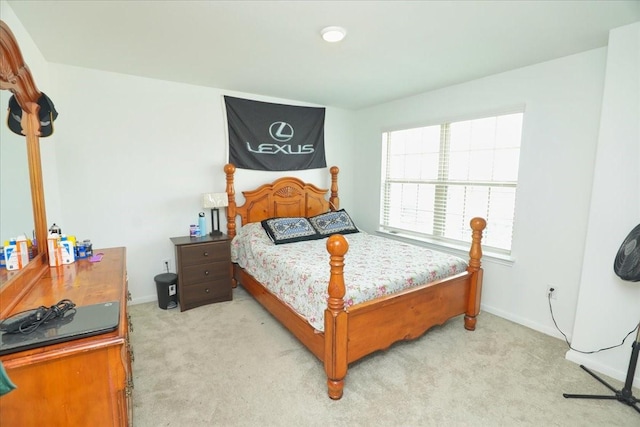 17014 Wild Stream Ct, Conroe, TX 77302 - bedroom with baseboards and light carpet