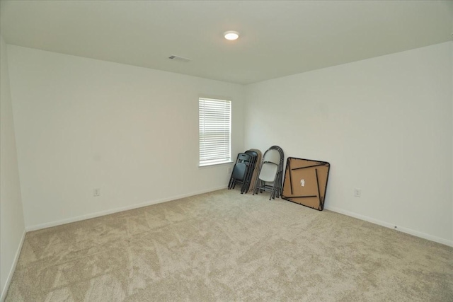 17014 Wild Stream Ct, Conroe, TX 77302 - carpeted spare room with visible vents and baseboards