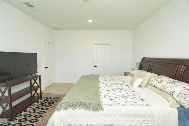 17014 Wild Stream Ct, Conroe, TX 77302 - bedroom with visible vents, light carpet, and recessed lighting