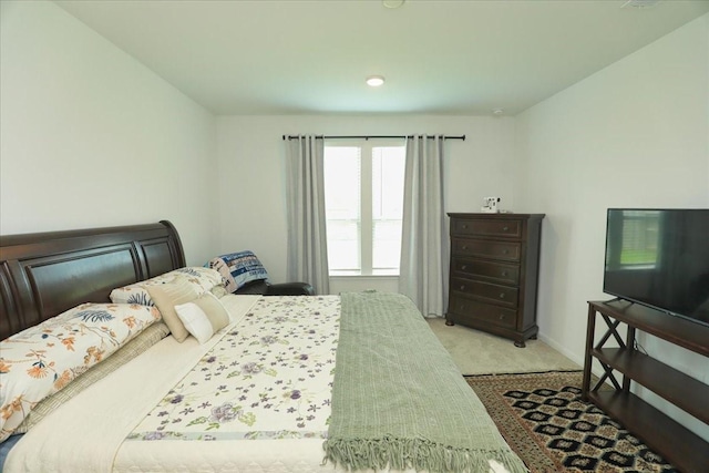 17014 Wild Stream Ct, Conroe, TX 77302 - bedroom featuring baseboards and carpet floors