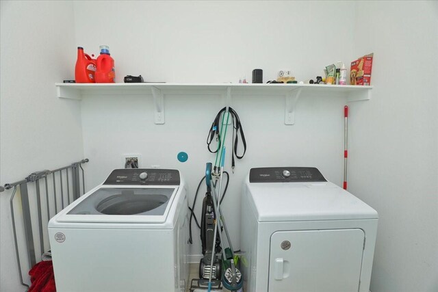 17014 Wild Stream Ct, Conroe, TX 77302 - laundry room with laundry area and independent washer and dryer