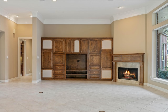 8802 Kennet Valley Rd, Spring, TX 77379 - unfurnished living room featuring light tile patterned flooring, crown molding, a premium fireplace, recessed lighting, and baseboards