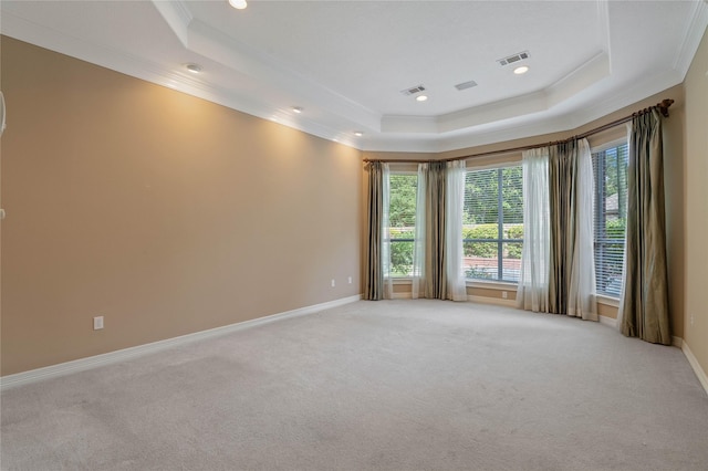 8802 Kennet Valley Rd, Spring, TX 77379 - unfurnished room with a raised ceiling, crown molding, light colored carpet, baseboards, and recessed lighting