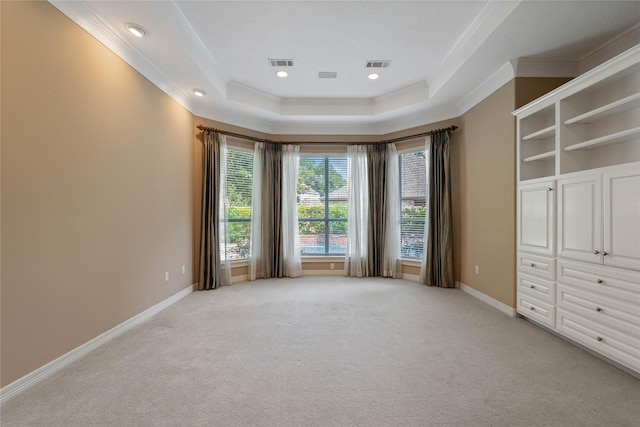 8802 Kennet Valley Rd, Spring, TX 77379 - unfurnished bedroom featuring ornamental molding, light carpet, a tray ceiling, baseboards, and recessed lighting