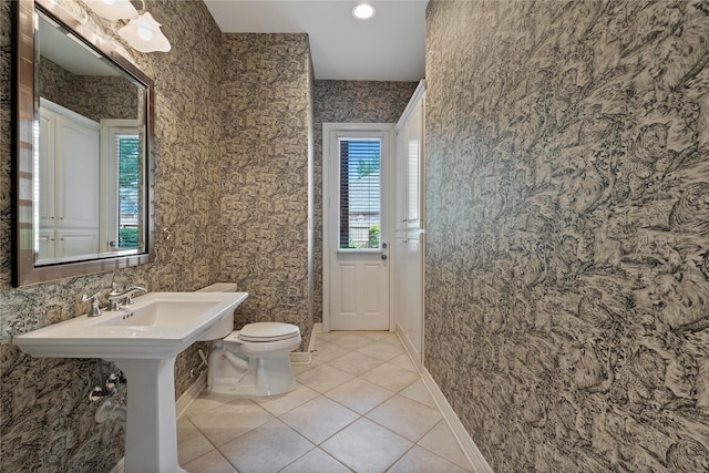 8802 Kennet Valley Rd, Spring, TX 77379 - bathroom featuring toilet, tile patterned floors, and recessed lighting
