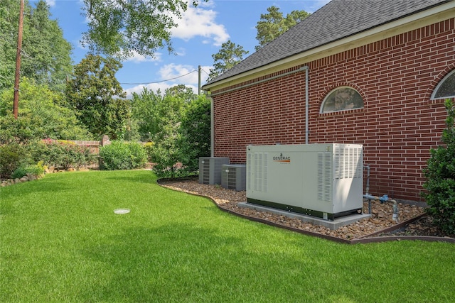 8802 Kennet Valley Rd, Spring, TX 77379 - view of green lawn featuring cooling unit