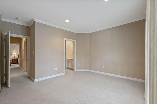 8802 Kennet Valley Rd, Spring, TX 77379 - unfurnished bedroom featuring ornamental molding, light colored carpet, baseboards, recessed lighting, and connected bathroom