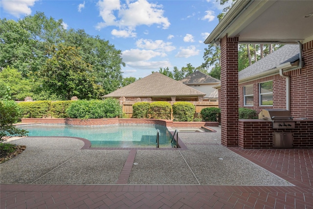 8802 Kennet Valley Rd, Spring, TX 77379 - view of pool with a grill, a patio, and a fenced backyard