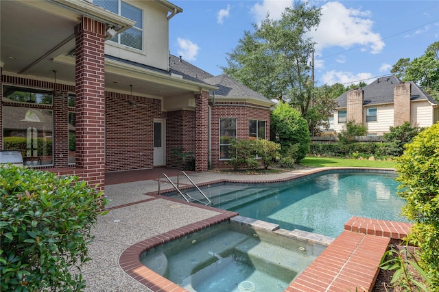 8802 Kennet Valley Rd, Spring, TX 77379 - view of pool featuring a patio and a pool with connected hot tub