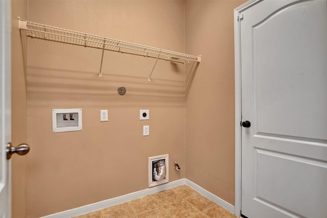laundry area featuring laundry area, baseboards, hookup for a washing machine, gas dryer hookup, and electric dryer hookup