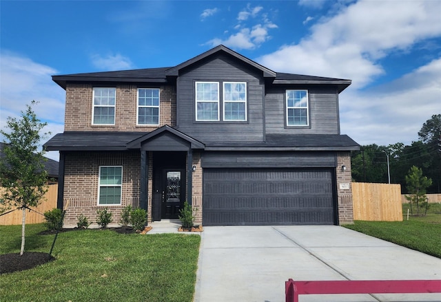 507 Sacred Fig Ln, Crosby, TX 77532 - view of front of house with brick siding, concrete driveway, and an attached garage