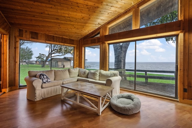 living area with wood ceiling, wood walls, and vaulted ceiling