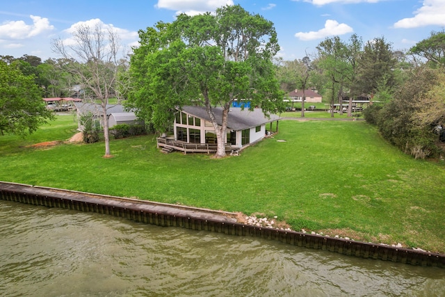 drone / aerial view with a water view