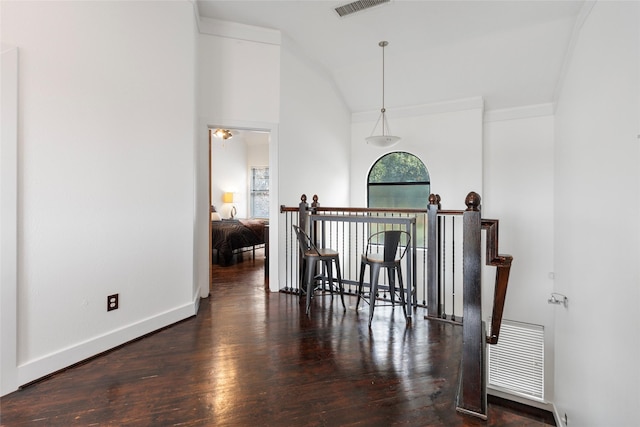 3412 St Emanuel St, Houston, TX 77004 - corridor featuring wood finished floors, an upstairs landing, baseboards, ornamental molding, and high vaulted ceiling