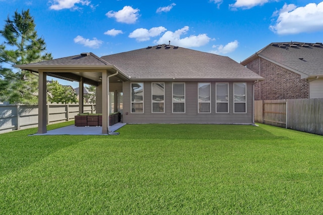 17052 Easter Lily Dr, Conroe, TX 77385 - rear view of house with a patio area, a shingled roof, and an outdoor hangout area