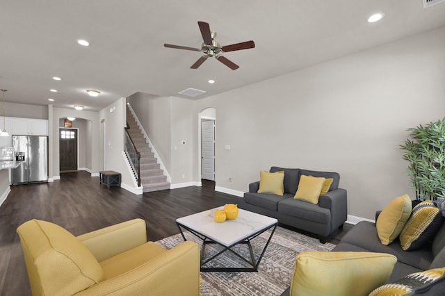 17052 Easter Lily Dr, Conroe, TX 77385 - living area featuring arched walkways, stairs, a ceiling fan, dark wood-style floors, and recessed lighting