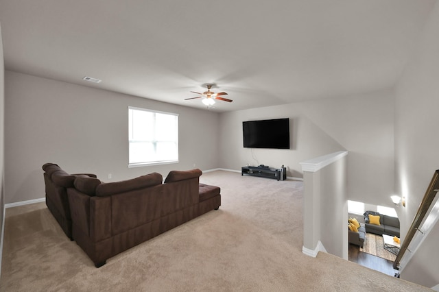17052 Easter Lily Dr, Conroe, TX 77385 - living area with carpet floors, ceiling fan, and baseboards