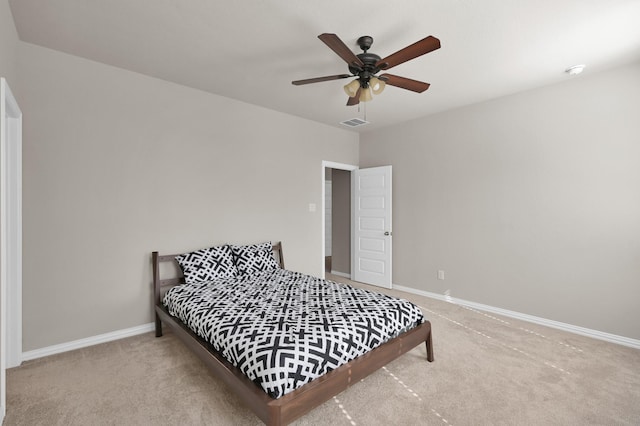 17052 Easter Lily Dr, Conroe, TX 77385 - bedroom with carpet, baseboards, and a ceiling fan
