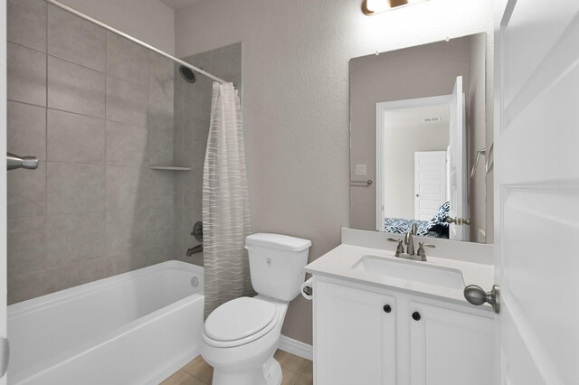 17052 Easter Lily Dr, Conroe, TX 77385 - bathroom with vanity, toilet, and shower / tub combo with curtain