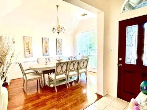 23006 Greenrush Dr, Katy, TX 77494 - entrance foyer featuring an inviting chandelier and wood finished floors