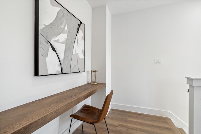 3117 Evella St, Houston, TX 77026 - home office featuring wood finished floors and baseboards