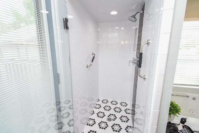 full bath featuring a shower stall