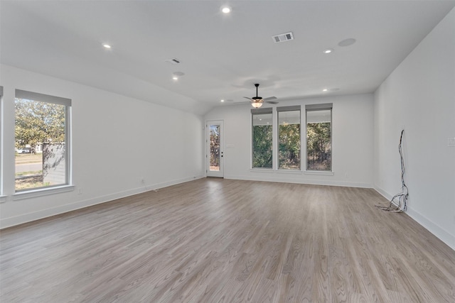 spare room featuring visible vents, baseboards, light wood finished floors, and a ceiling fan