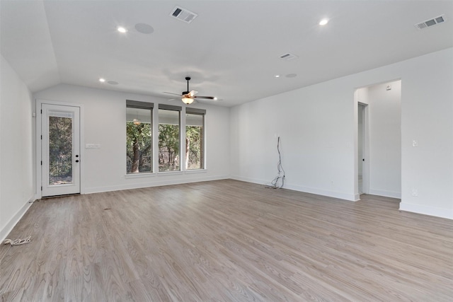 unfurnished living room with light wood-style floors, ceiling fan, baseboards, and visible vents